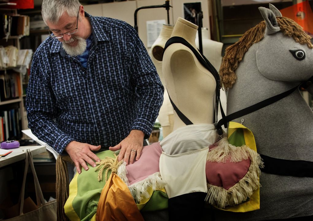 Terry Frank, longtime Pacific Northwest ballet milliner/craftsperson, shows part of the work he did for one of the gingerbread horses created for “The Nutcracker.” (Ellen M. Banner / The Seattle Times)