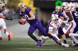 Yes, Jacob Eason is different. But UW coach Chris Petersen still wants you  to keep 'perspective.'