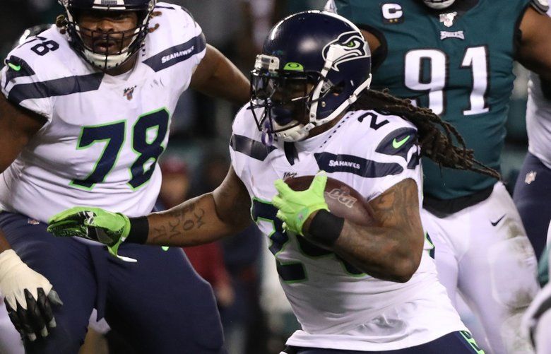 Marshawn Lynch shakes tacklers, then hands for Seahawks - The Columbian