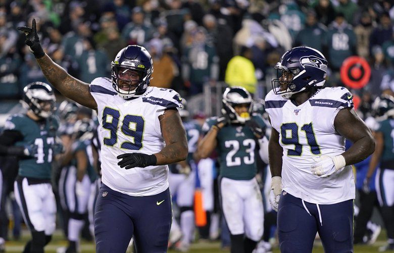 Seattle Seahawks defensive end Quinton Jefferson (99) reacts after