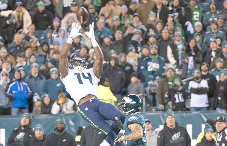 Pete Carroll took his shirt off when he met DK Metcalf at the NFL Comb