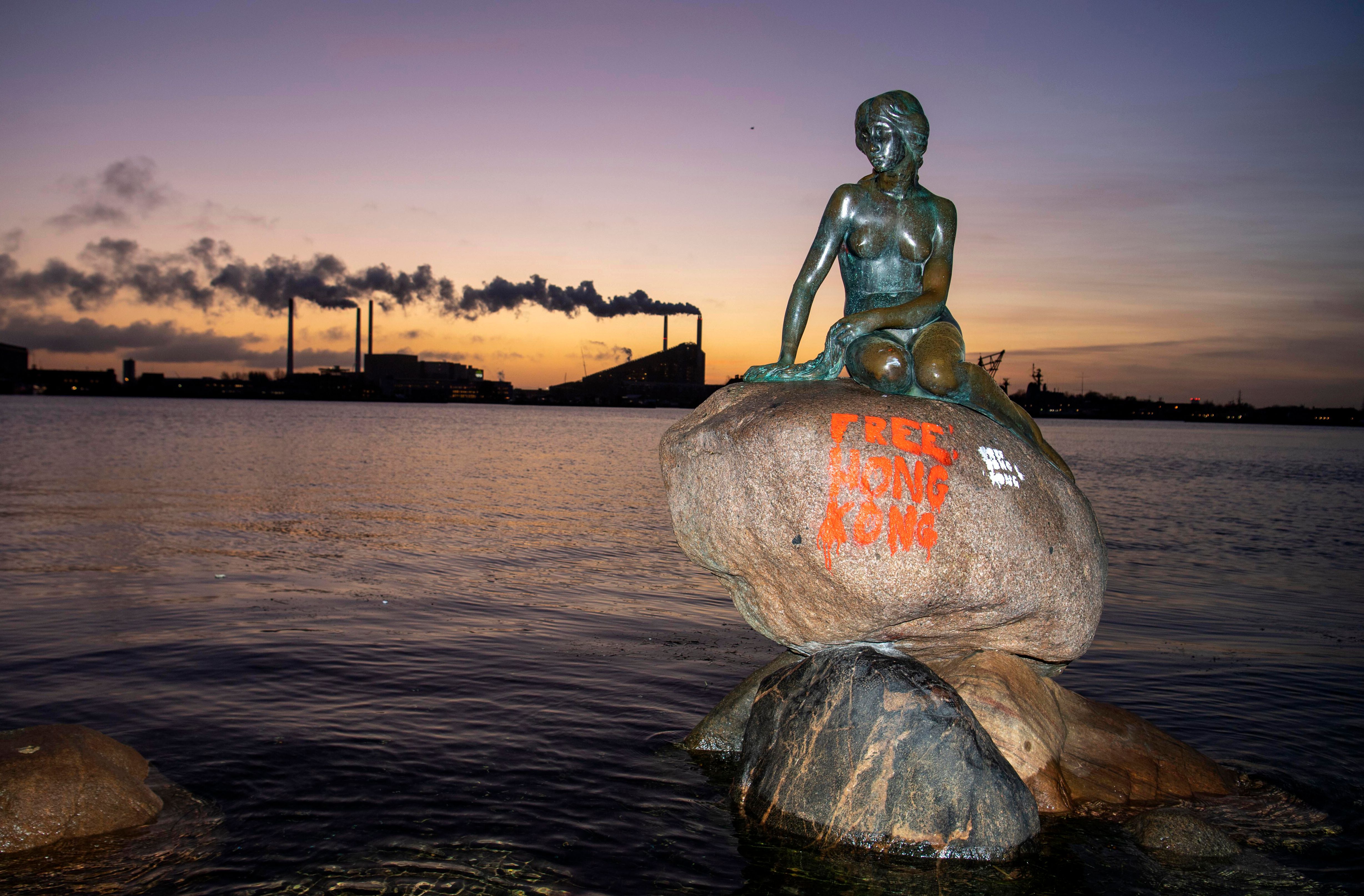 Graffiti painted on Copenhagen's Little Mermaid statue | The
