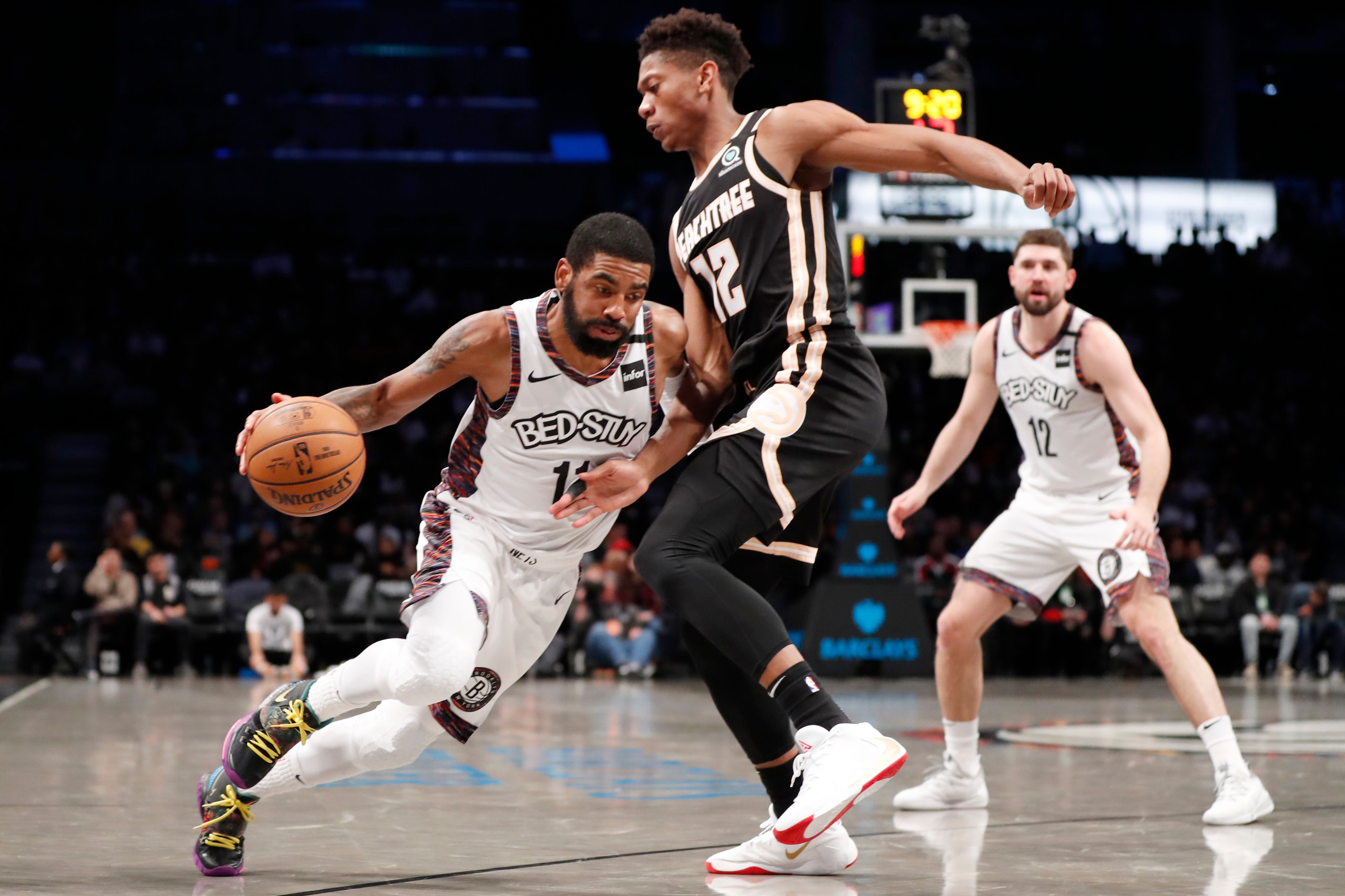 Kyrie Irving returns to help Nets rout Hawks | The Seattle Times