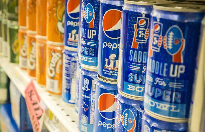 Cans of Super Bowl branded Pepsi in a grocery store in New York on Feb. 14, 2017. Despite a few cities like Philadelphia passing a soda tax, the beverage industry is winning the war over soda taxation. (Richard B. Levine/Sipa USA/TNS) 1556534 1556534