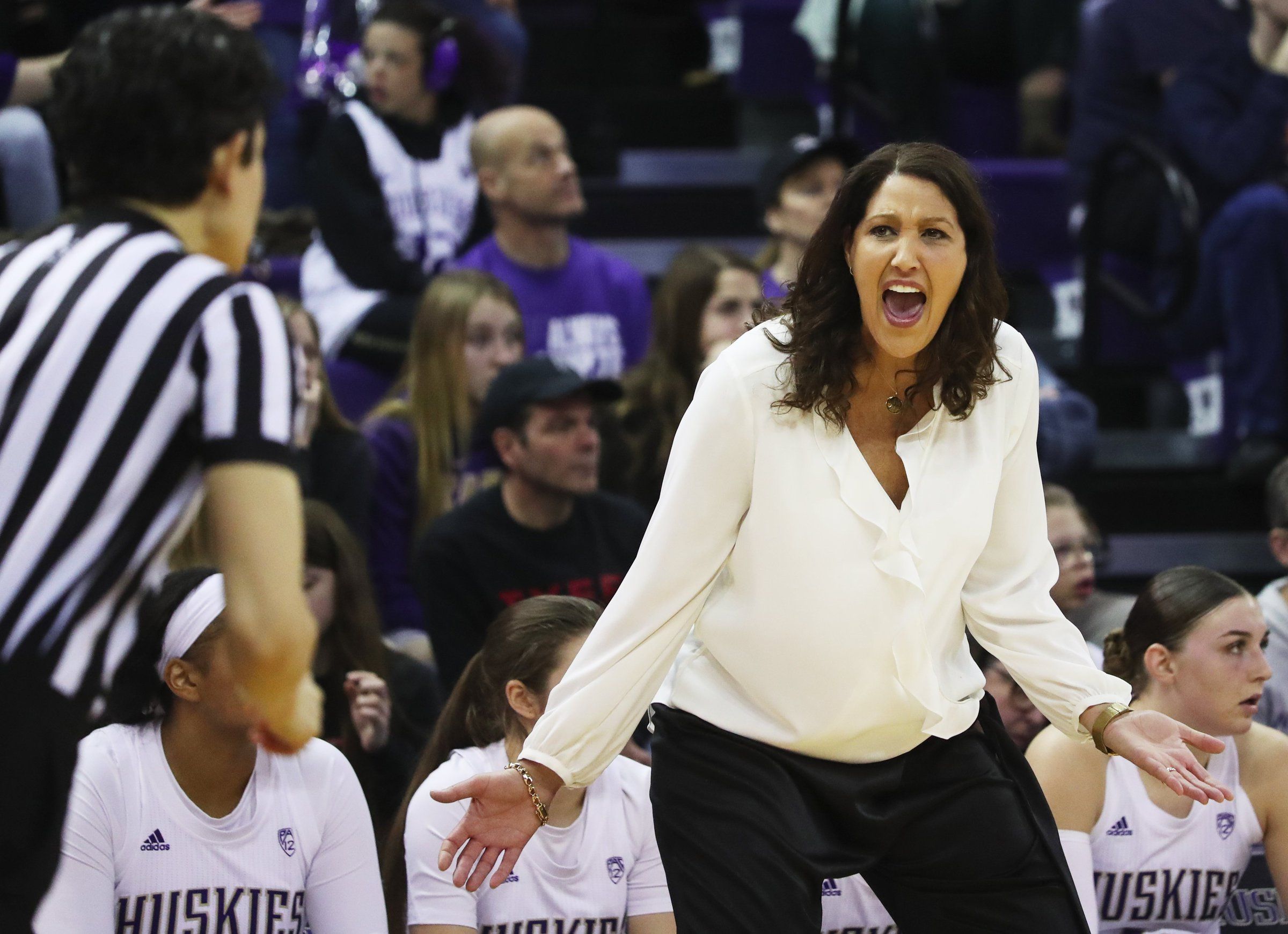 All You Need to Know About UW Women's Basketball Coach