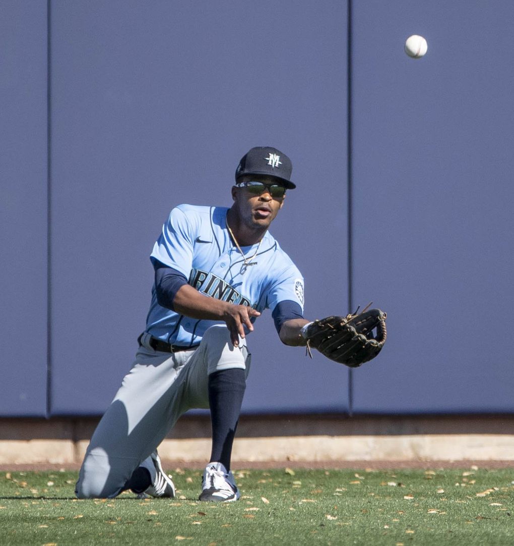 Seattle center fielder Mallex Smith makes a quick adjustment for the fly ball off the bat of Milwaukee’s Manny Pina. (Dean Rutz / The Seattle Times)