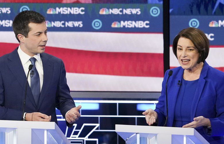 FILE — Sen. Amy Klobuchar (D-Minn.) and Pete Buttigieg during the Democratic presidential debate, where he attacked her on her voting record on judicial nominees, in Las Vegas, Feb. 19, 2020. The senator is running for president on her bipartisan record. But some Democrats and civil rights groups say she went too far in supporting judges chosen by the current administration. (Erin Schaff/The New York Times)  XNYT224 XNYT224