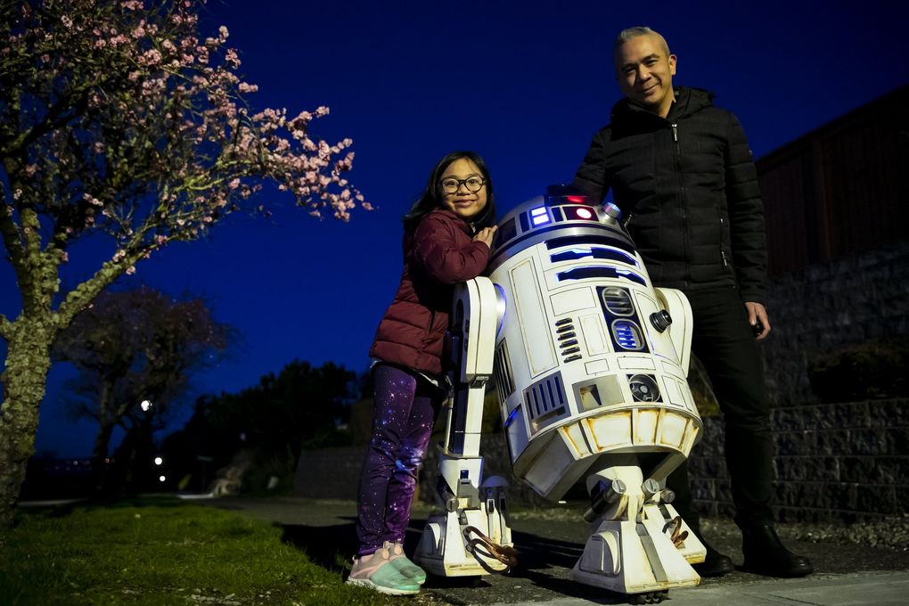 Harley and her father, Dino Ignacio, built an R2-D2 who’s now known as the West Seattle Droid. Their R2 unit makes appearances at the West Seattle Farmers Market and community events. (Erika Schultz / The Seattle Times)