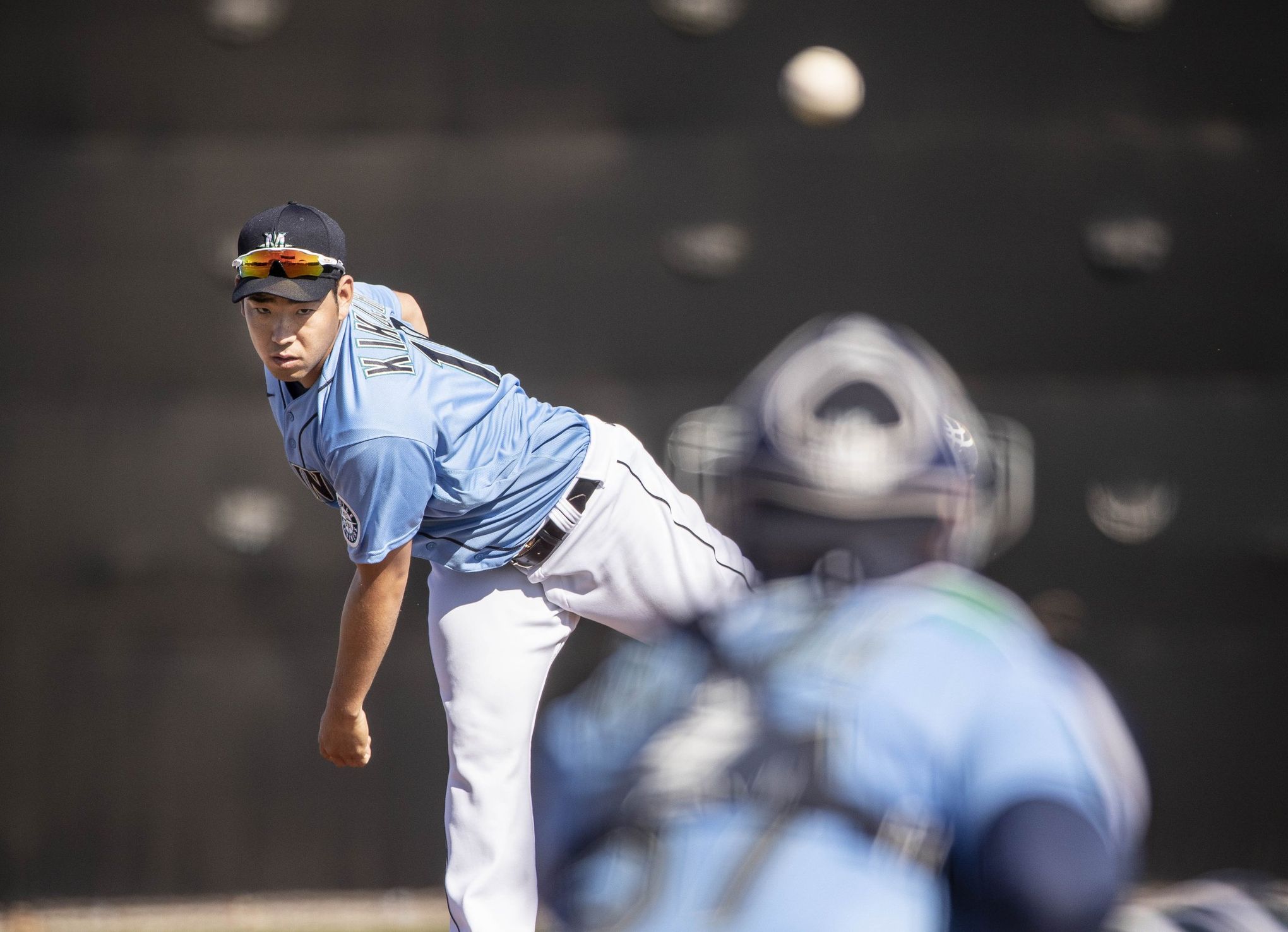 Seattle Mariners pitcher Yusei Kikuchi puts entire container of