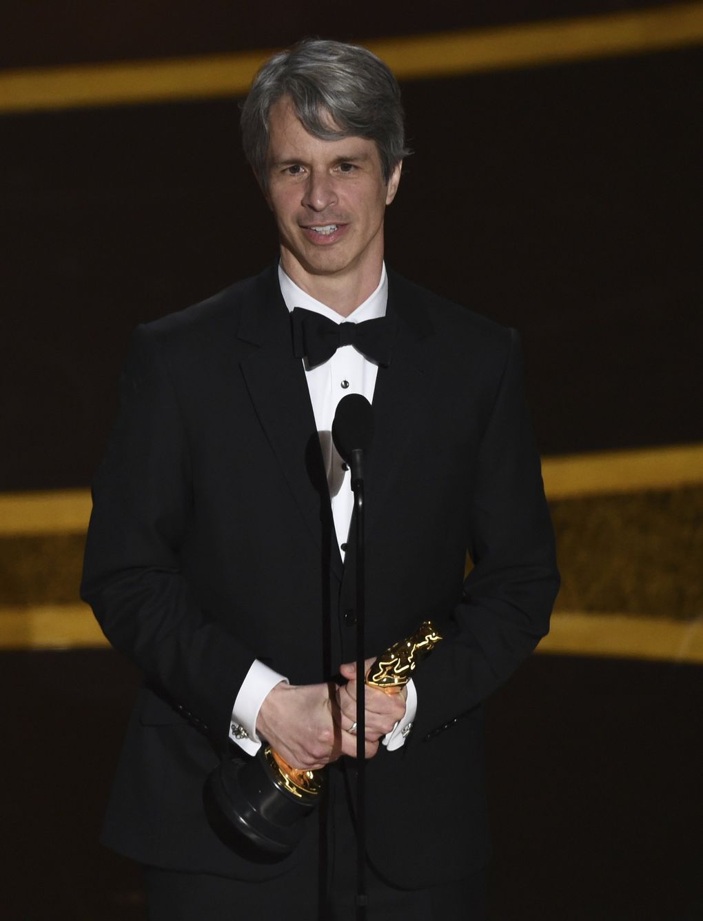 Marshall Curry accepts the award for best live action short film for “The Neighbors’ Window” at the Oscars on Sunday, Feb. 9, 2020, at the Dolby Theatre in Los Angeles. (AP Photo/Chris Pizzello) CADC238 CADC238 (Chris Pizzello / Chris Pizzello/Invision/AP)