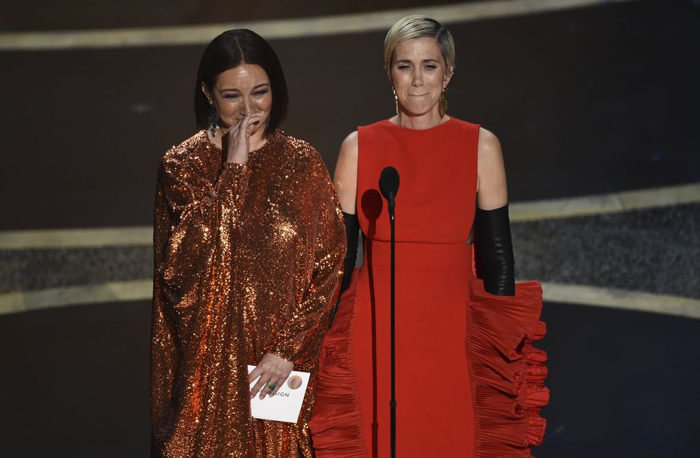Maya Rudolph, left, and Kristen Wiig present the award for best production design at the Oscars on Sunday, Feb. 9, 2020, at the Dolby Theatre in Los Angeles. (AP Photo/Chris Pizzello) CADC249 CADC249 (Chris Pizzello / Chris Pizzello/Invision/AP)