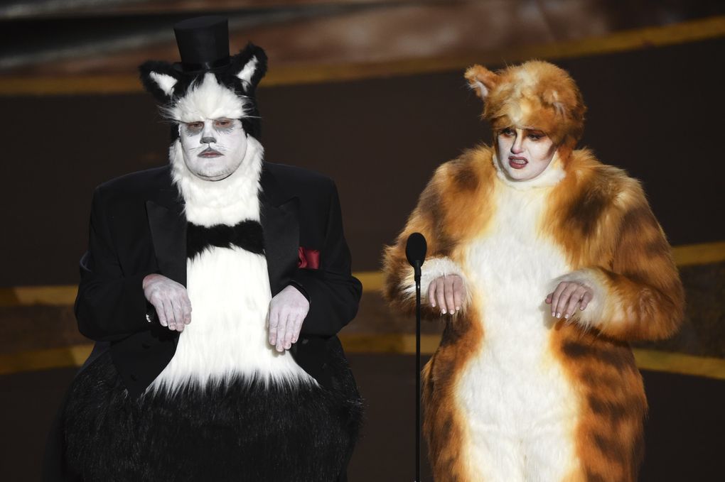 James Corden, left, and Rebel Wilson present the award for best visual effects at the Oscars. (AP Photo/Chris Pizzello)