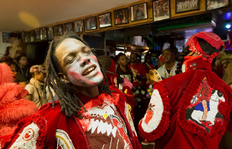 Marwan Pleasant, a flag boy for the Golden Eagles on Mardi Gras, at Sportsman’s Corner in New Orleans on Feb. 13, 2018. Two years ago, a photographer began documenting the remaining black-owned bars and lounges on a storied stretch of St. Bernard Avenue and inside these spaces, tradition is paramount. (L. Kasimu/The New York Times)