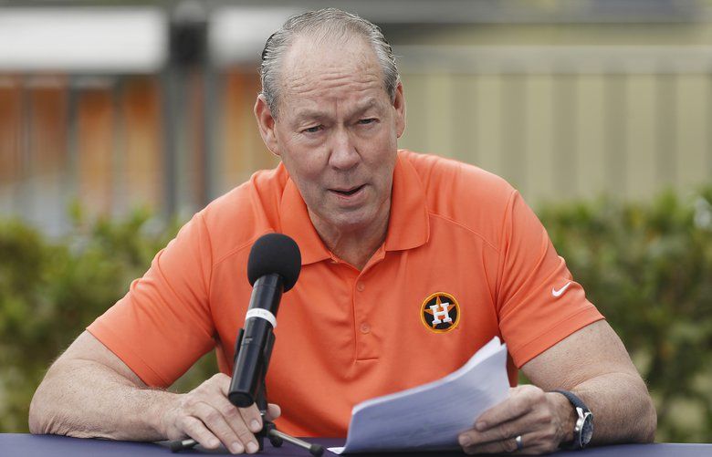 Owner Jim Crane of the Houston Astros reads a prepared statement during a press conference at FITTEAM Ballpark of The Palm Beaches on Feb. 13, 2020 in West Palm Beach, Fla. (Michael Reaves/Getty Images/TNS)  1572379 1572379