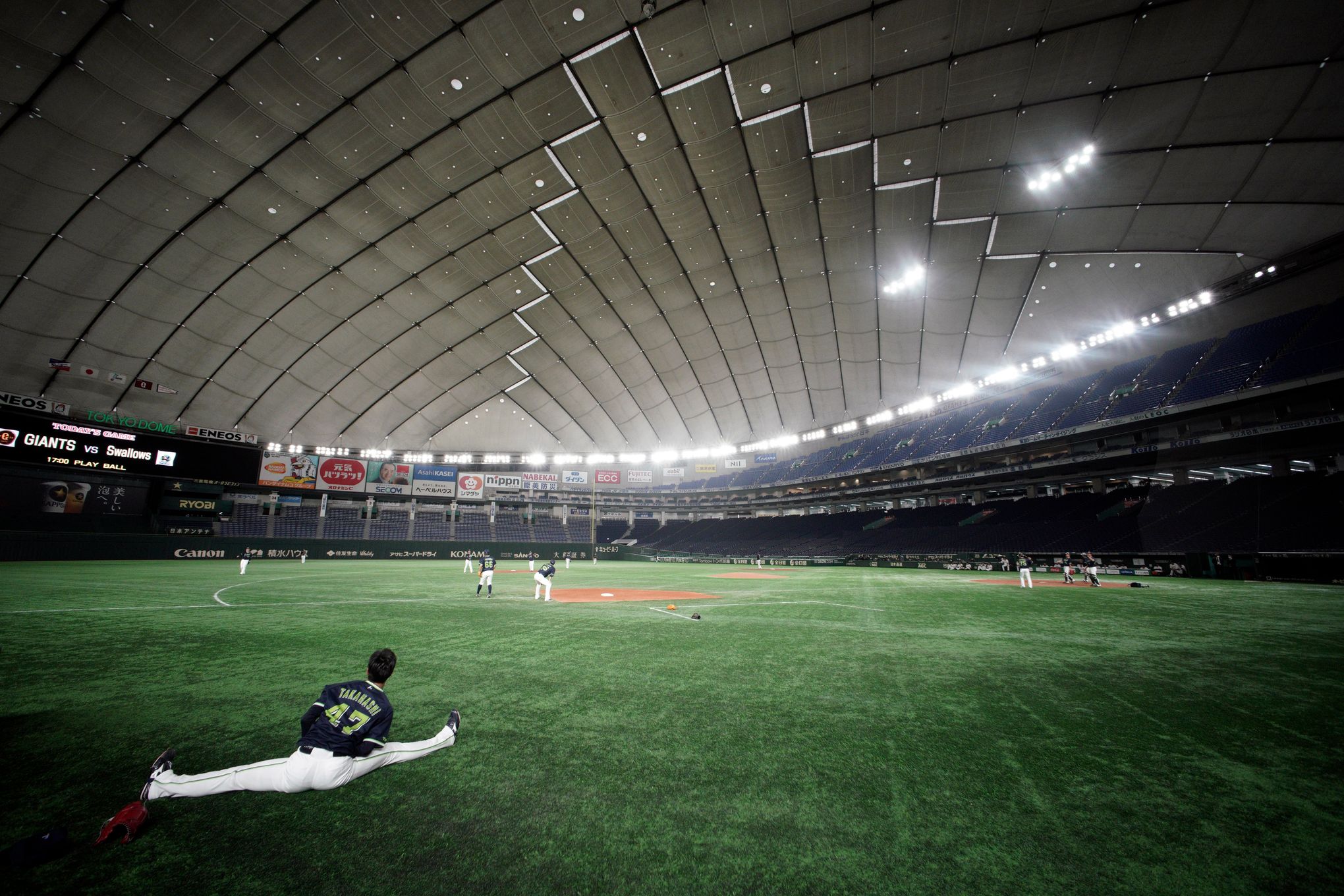 AP PHOTOS: Stadiums deserted as virus postpones opening day