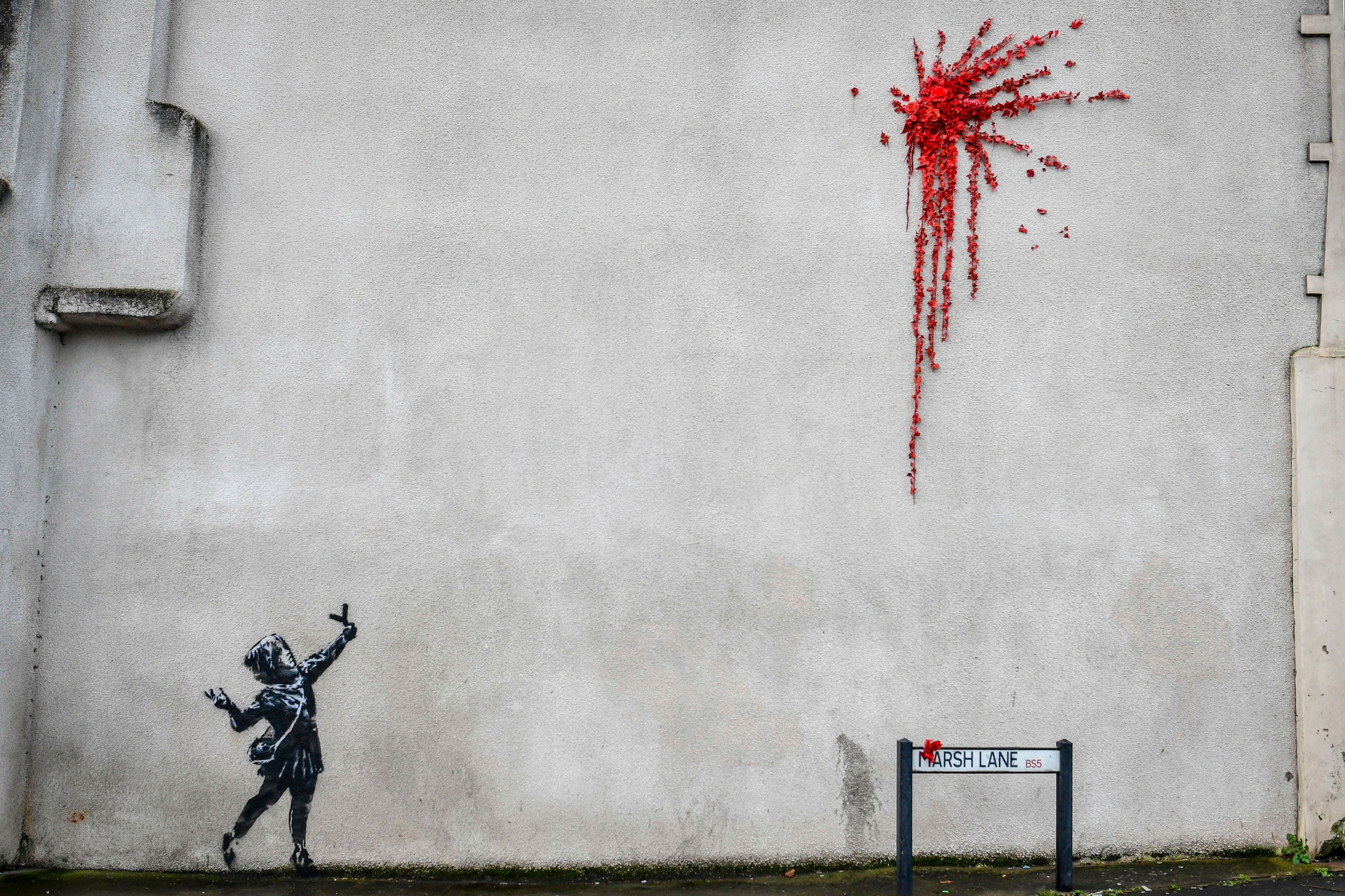 Banksy's Valentine's Day mural covered after it was defaced | The
