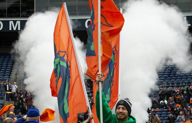 Flag bearers run onto the field in front of the Seattle Dragons players before the start of Saturday’s game.

The Seattle Dragons play the Dallas Renegades in the second XFL home game at CenturyLink Field in Seattle Saturday, February 22, 2020.  22,000 fans are expected to attend the game.

 213054