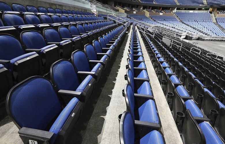 The seats are empty at the Amway Center in Orlando, home of the NBA’s Orlando Magic, on Thursday, March 12, 2020. The NBA has suspended its season â€œuntil further notice” after a Utah Jazz player tested positive Wednesday for the coronavirus, a move that came only hours after the majority of the league’s owners were leaning toward playing games without fans in arenas.  (Stephen M. Dowell /Orlando Sentinel via AP) FLORL104