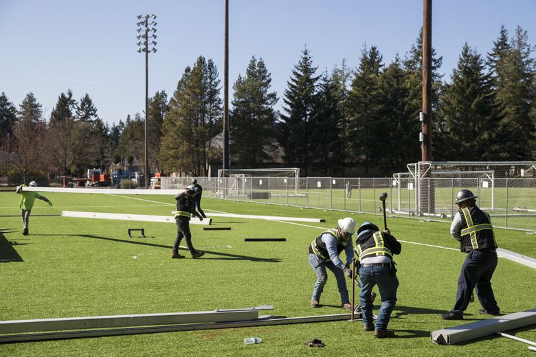 Rio restarts soccer league next to field hospital for COVID