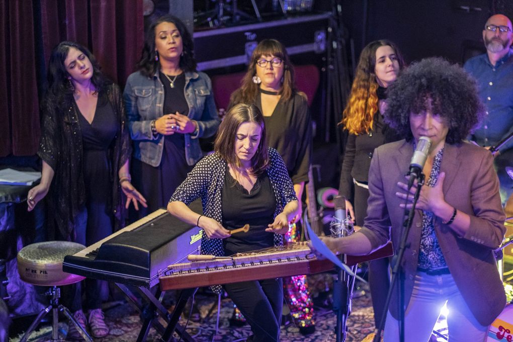 Local jazz artist Marina Albero, center, joins fellow musicians onstage livestreaming a show from the House Of Breaking Glass in Shoreline. (Dean Rutz / The Seattle Times)
