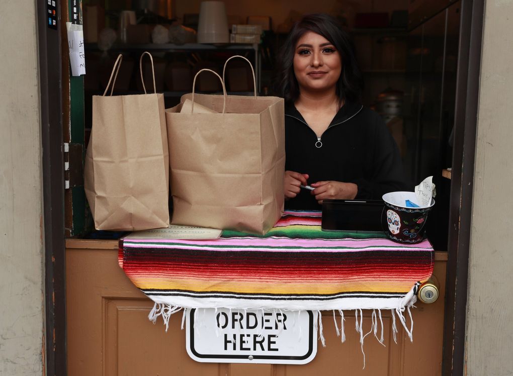 A portrait of Marlan Santos-Avalos is taken at Frelard Tamales March 17, 2020. Santos-Avalos says the business treats employees like family, and focuses on helping the broader community. (Erika Schultz / The Seattle Times)