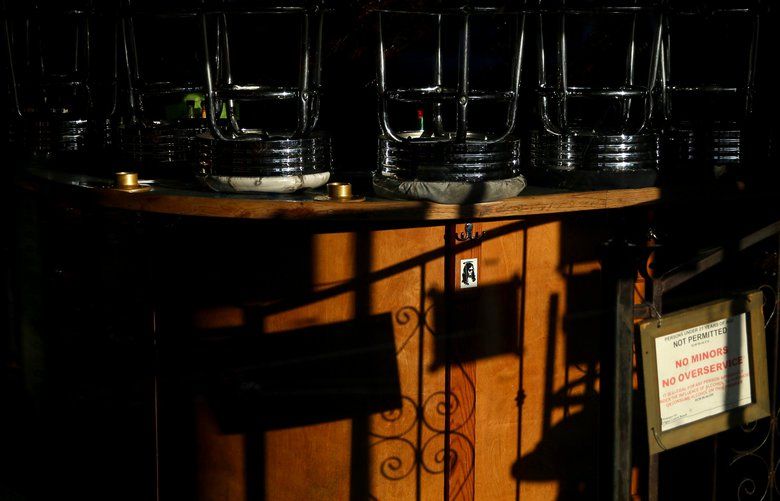 Bar stools sit on top of the counter at Cafe Racer on March 18, 2020. Cafe Racer was in the midst of a fundraiser to save the cafe before the coronavirus effectively shut the city down.