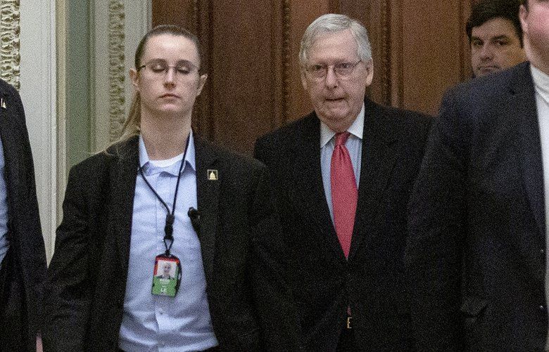 United States Senate Majority Leader Mitch McConnell (Republican of Kentucky) walks to the Senate floor as he arrives to the United States Capitol in Washington D.C., U.S. on Wednesday, March 25, 2020. The Senate is set to vote on a Coronavirus Stimulus Package after working late into the night on Tuesday to finalize a two trillion dollar deal. (Stefani Reynolds/CNP/Sipa USA/TNS) 1616483 1616483