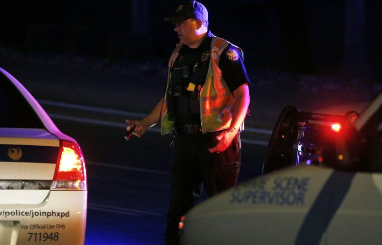 Phoenix officer killed, 2 others wounded; gunman killed | The Seattle Times