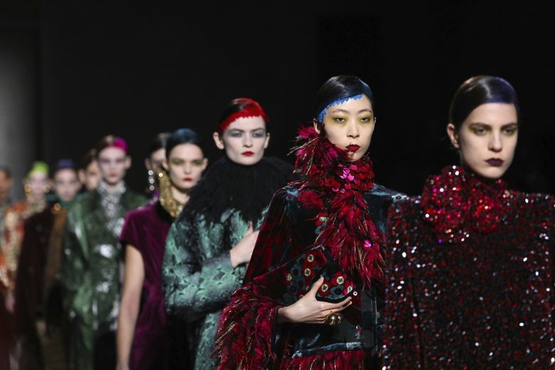 Models show off rich, wintry jewel tones at the Dries van Noten show at Paris Fashion Week last month. (Vianney Le Caer / Invision / The Associated Press)