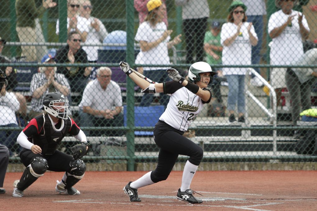 Redmond’s Jennifer Cummings hits a double while playing in the third-place game at the Class 3A state tournament in 2018. (Jason Redmond / The Seattle Times)