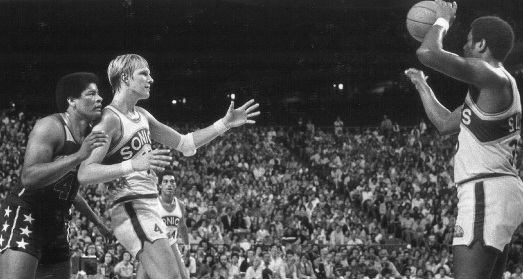 Sonics Paul Silas (with ball), Jack Sikma (41) and Dennis Johnson play an NBA Finals game in the Kingdome. (Jay Lurie / )