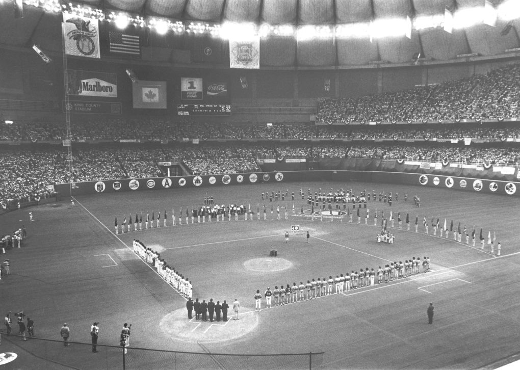 A capacity crowd of 58,906 stands for the singing of the Canadian and American National Anthems at the 1979 All-Star Game at the Kingdome in Seattle. (Cole Porter / The Seattle Times)