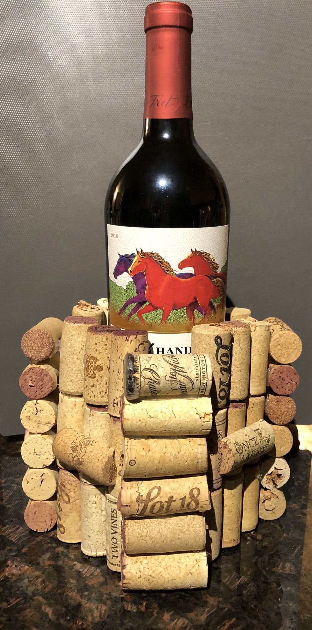 Lauren Loh started without a plan. Then the plan became to make a vase. She ended up with a wine-bottle holder made of wine corks. (Stefanie Loh / The Seattle Times)