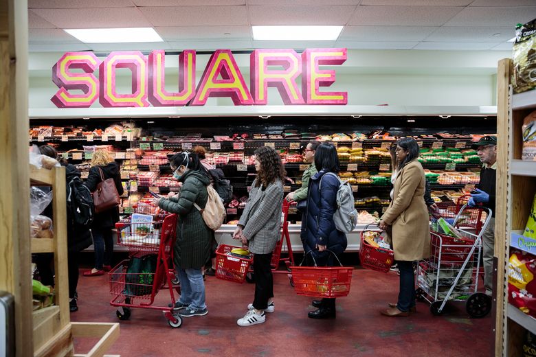 Shoppers line up inside Trader Joe’s in Union Square in New York, March 11, 2020. Americans have been alarmed by empty grocery shelves, but while food suppliers and retailers say they are struggling with surging demand, they insist the supply chain remains strong. (Sarah Blesener/The New York Times)