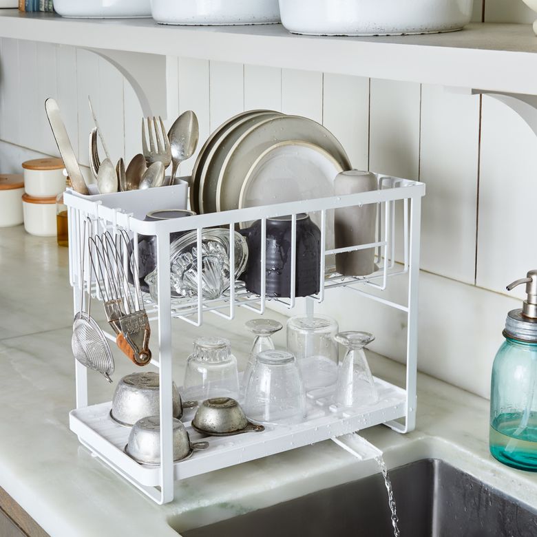 Paper tray and a drying mat cut in half makes a great bottle station if you  lack cabinet space. Any other hacks to make my house not look like Fisher  Price designed