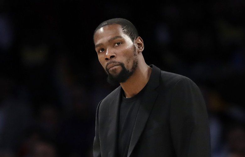 Brooklyn Nets’ Kevin Durant, a former Seattle Sonic, has tested positive for the conronavirus, one of seven players in the NBA. Dozens more have been tested. (AP Photo/Marcio Jose Sanchez, file) 