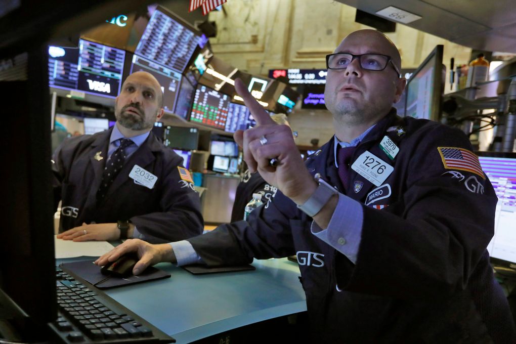 Specialists James Denaro, left, and Mario Picone work on the floor of the New York Stock Exchange, Tuesday, March 10, 2020. Stocks, Treasury yields and oil are clawing back some of the plunge they took a day before, when the S&P 500 had its worst drop in more than a decade. (AP Photo/Richard Drew)