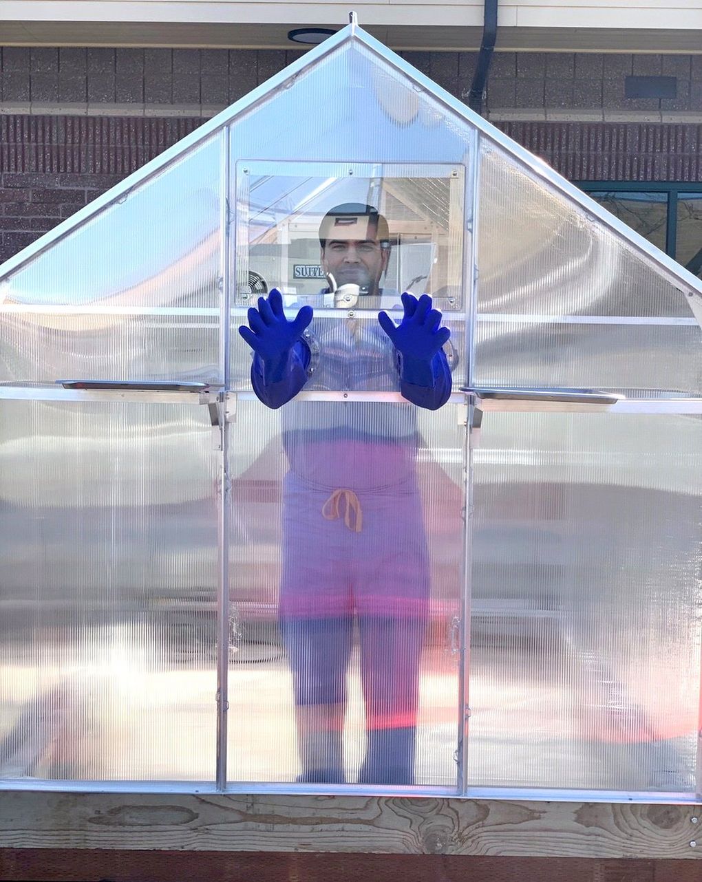 Anubhav Kanwar, an infectious disease specialist at Tri-State Memorial Hospital in Clarkston, Washington, had the idea to reverse engineer a greenhouse designed to work with germs into a modified COVID-19 testing cabin. (Courtesy of Anubhav Kanwar)