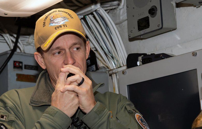 A photo provided by the U.S. Navy shows Capt. Brent Crozier, who was removed April 2, 2020, from command of the aircraft carrier USS Theodore Roosevelt, addressing the crew in San Diego on Jan. 17, 2020. Colleagues say the downfall of Crozier was charging headlong into the Trump administration’s narrative that it had everything in the coronavirus pandemic under control. (Mass Communication Specialist Seaman Alexander Williams/U.S. Navy via The New York Times) **EDITORIAL USE ONLY** XNYT3 XNYT3