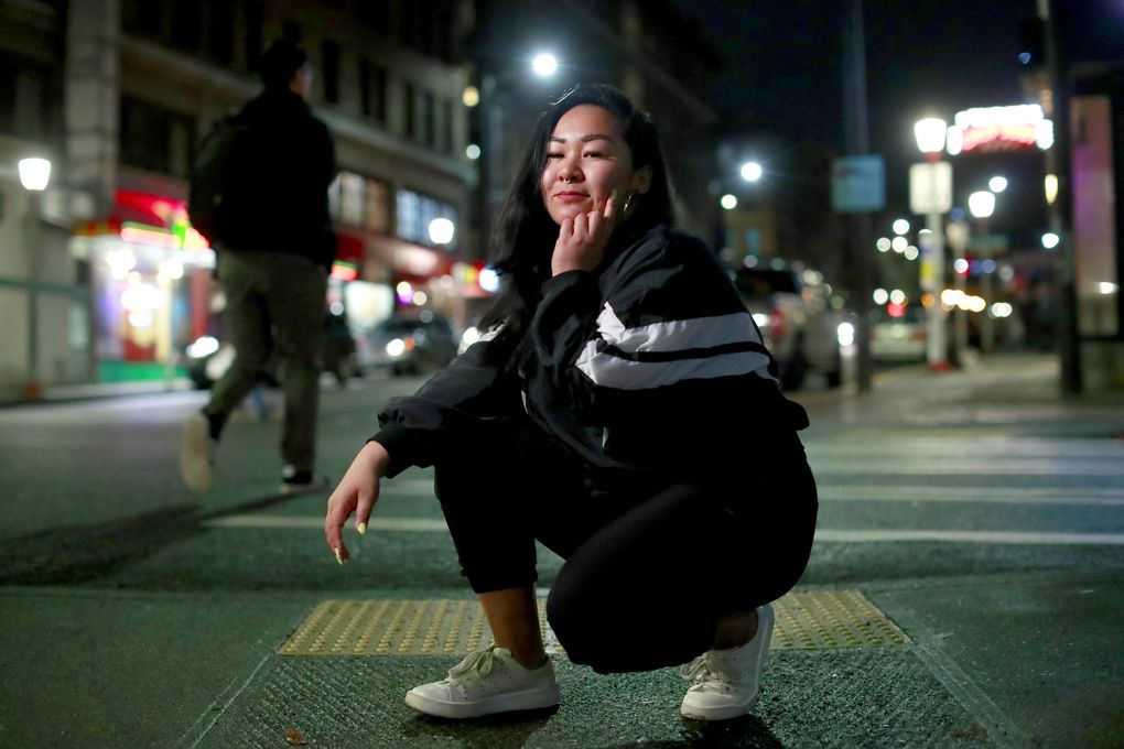 Theater artist Sara Porkalob in Chinatown International District, one of her favorite Seattle neighborhoods. (Erika Schultz / The Seattle Times)
