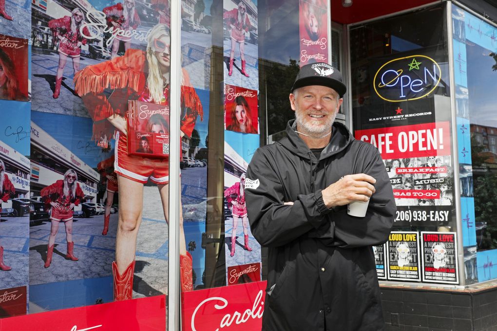 While most retail stores have shut down during the pandemic, Easy Street Records owner Matt Vaughan, in West Seattle, has been personally delivering records to folks around King County. (Ken Lambert / The Seattle Times)
