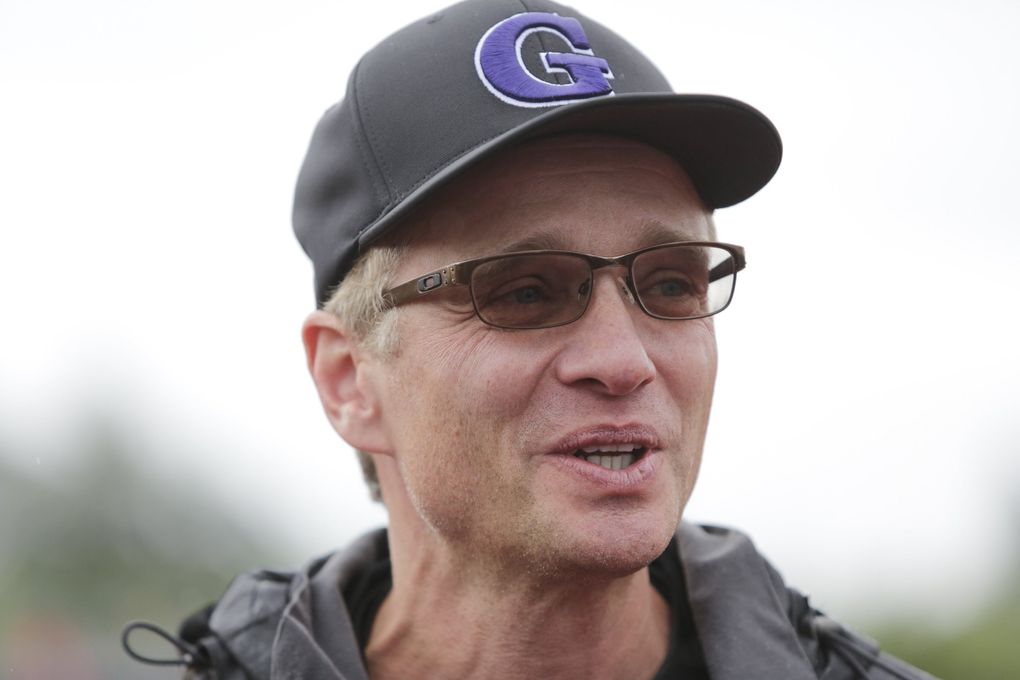 Garfield softball coach Ken Simpson led his team to a state title last year. (Jason Redmond / Special to The Seattle Times)