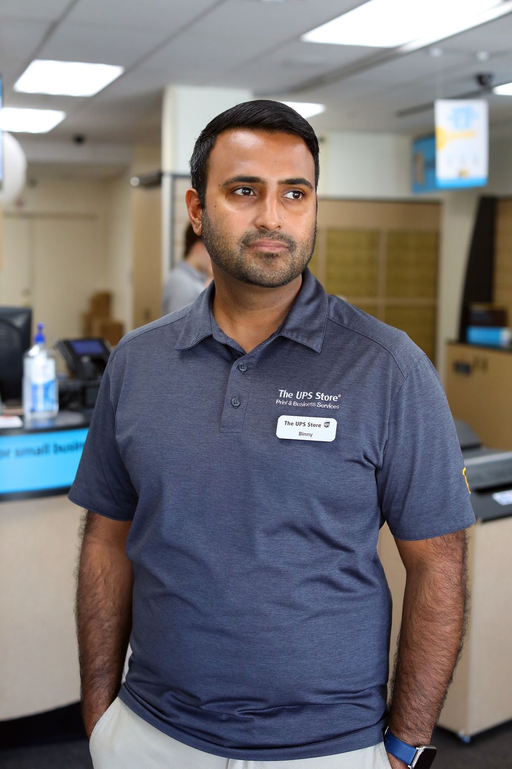 Abninder “Binny” Mundra at the UPS store he owns with his wife in Portola Valley, Calif., Wednesday. In the wake of the coronavirus epidemic, he applied for a disaster loan on March 20 and was approved four days later for $210,000. (Jim Wilson / The New York Times)