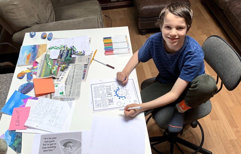 The author’s son, Isaac Butterfield, works on a time capsule.