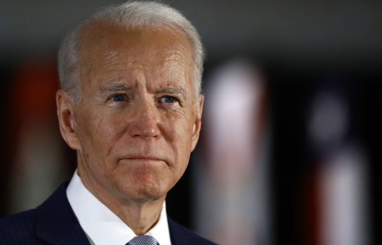 FILE – In this March 10, 2020, file photo Democratic presidential candidate former Vice President Joe Biden speaks to members of the press at the National Constitution Center in Philadelphia. (AP Photo/Matt Rourke, File) WX107 WX107