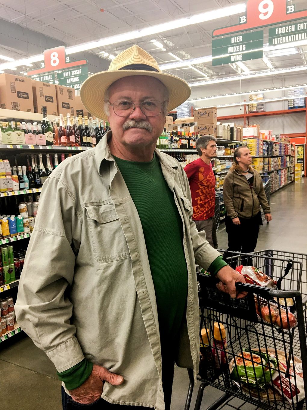 A shopper at WinCo in Bremerton, who only gave his name as Dwain, said he’s been harangued for his choice to forgo a face mask. “You can live in fear, or you can live,” he said Tuesday. (Christine Clarridge / The Seattle Times)