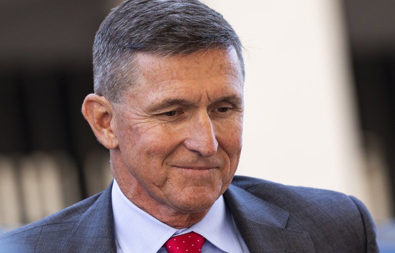 FILE – Michael Flynn, former National Security Advisor to President Donald Trump, at the Federal Courthouse for a sentencing hearing in Washington, July 10, 2018. Trump revived his attacks on law enforcement on Thursday as a pair of former advisers, Roger Stone Jr. and Michael Flynn, renewed their fights against their criminal convictions. (Samuel Corum/The New York Times) XNYT155 XNYT155
