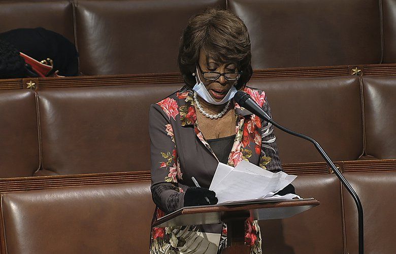 In this image from video, Rep. Maxine Waters, D-Calif., speaks on the floor of the House of Representatives at the U.S. Capitol in Washington, Thursday, April 23, 2020. (House Television via AP) DCJE371 DCJE371