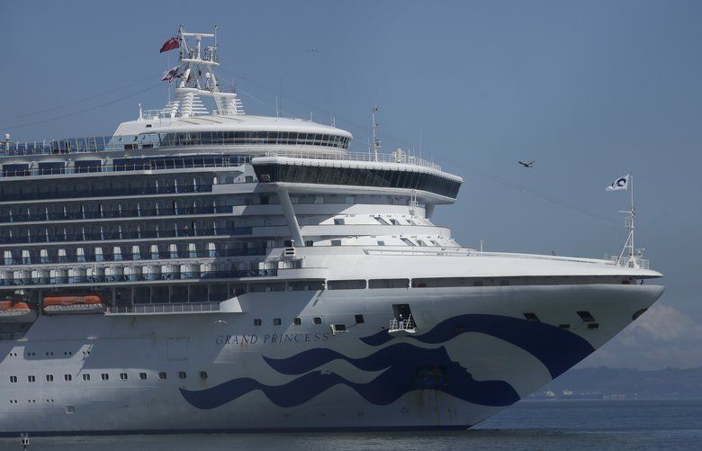 The Grand Princess cruise ship approaches Pier 35 to dock in San Francisco, Tuesday, April 7, 2020. (AP Photo/Jeff Chiu)