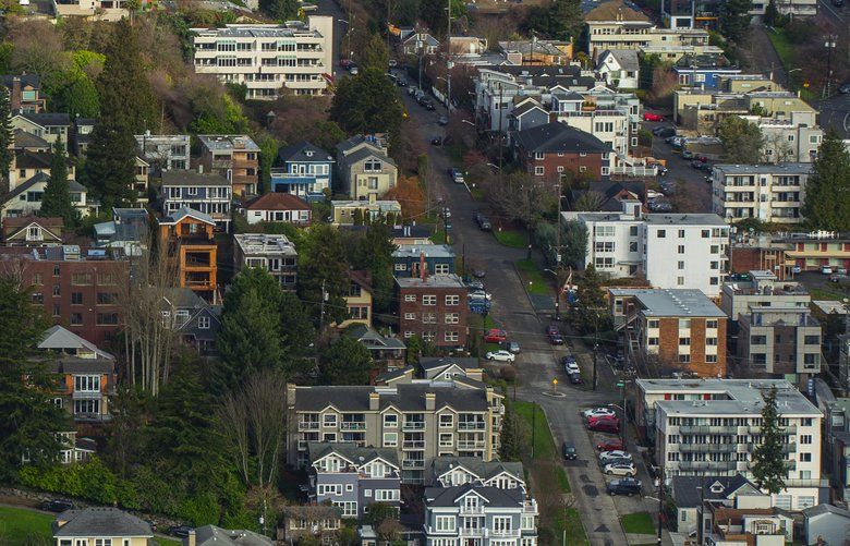 Seattle’s Queen Anne neighborhood, west of Hwy. 99, shot Monday, January 22, 2018.  Green Lake is at top right.   Shot from the Space Needle.